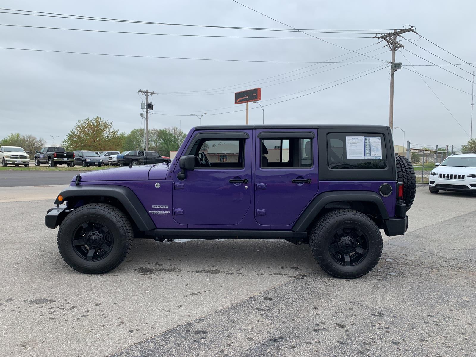 PreOwned 2017 Jeep Wrangler Unlimited Sport RHD Sport Utility in Saint